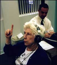 senior with presbycusis getting hearing test