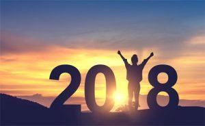 Woman enjoying view on the hill and 2018 years celebrating new year